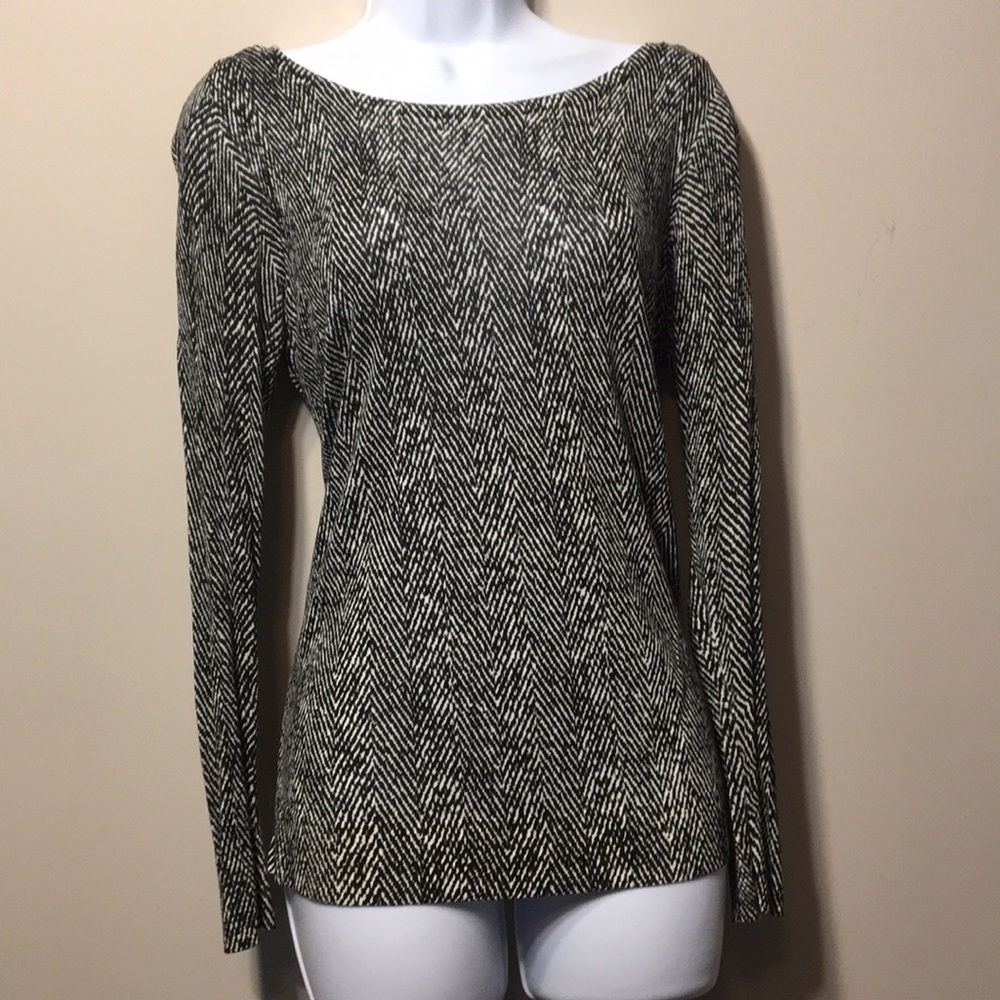 New. Never worn. Black and white long sleeve.